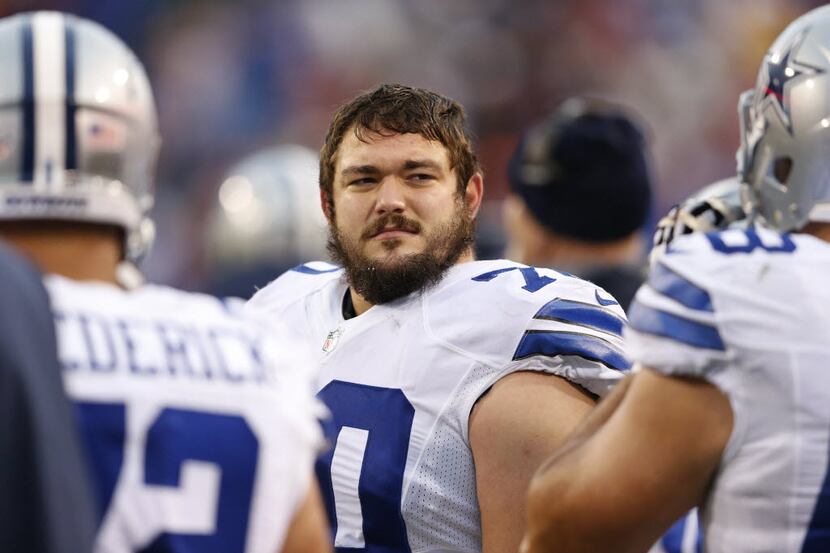 Dallas Cowboys guard Zack Martin (70) looks towards the stands during the second half of...