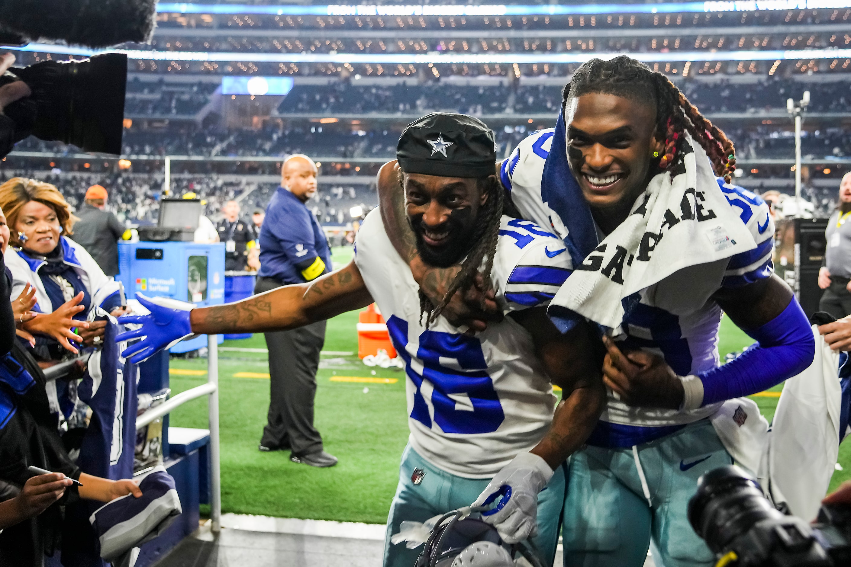 Dallas Cowboys wide receiver CeeDee Lamb (88) celebrates with wide receiver T.Y. Hilton (16)...