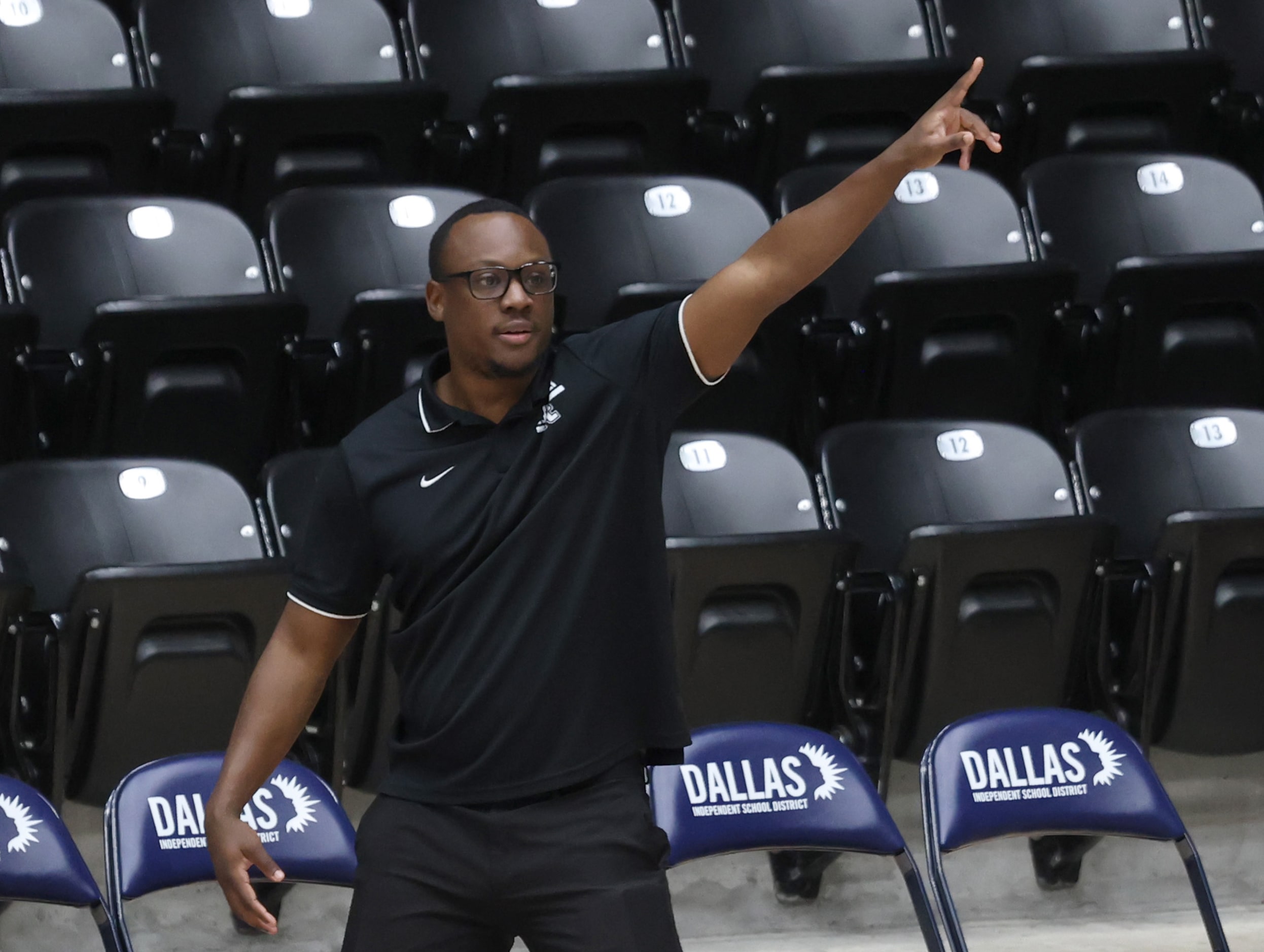 Frisco Panther Creek head coach Kevin Graham directs his players during second half action...