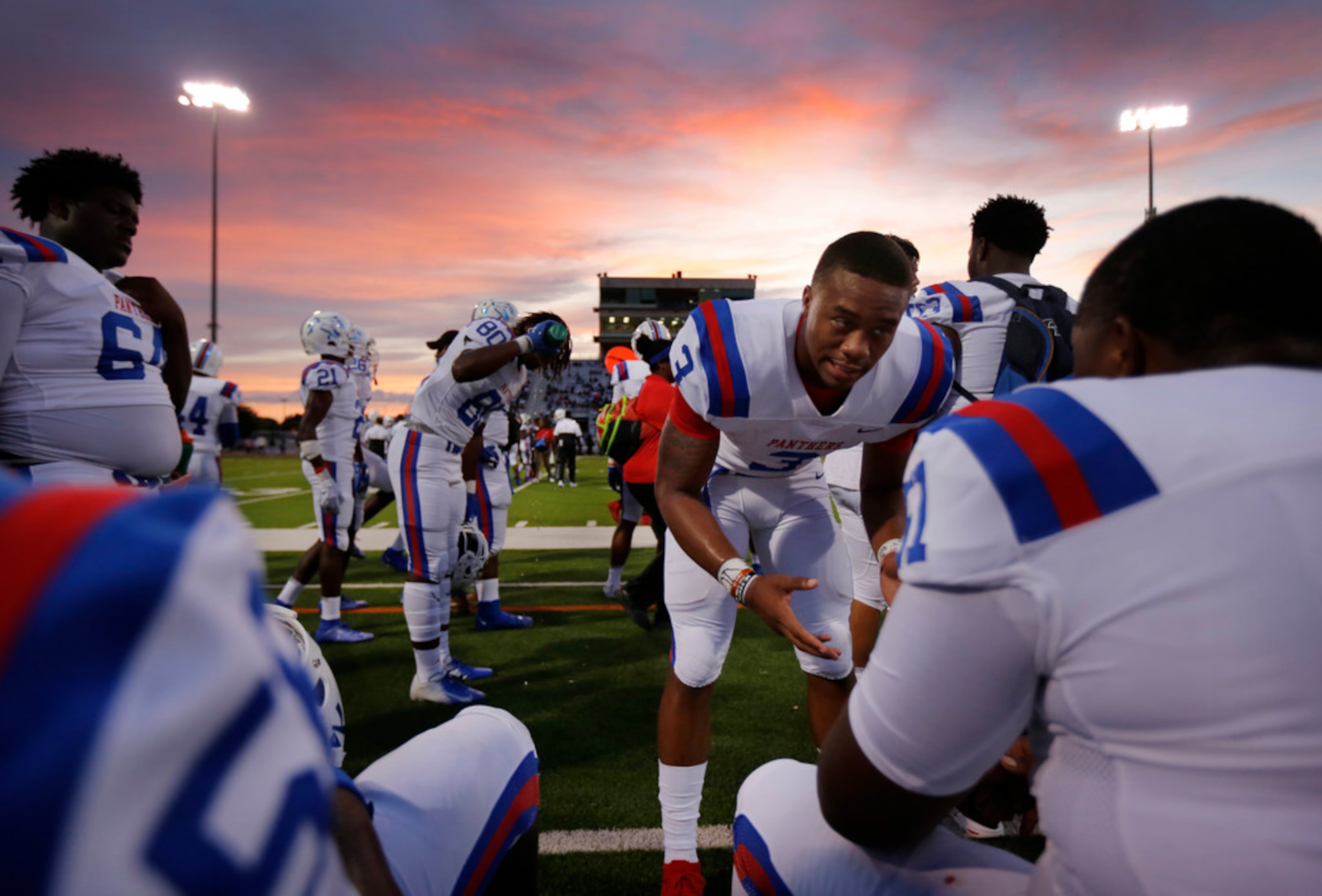 Duncanville quarterback Ja'Quinden Jackson (3) fires up his lineman as they got off to a...