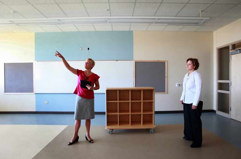 Angie Gaylord (left), then principal of Lady Bird Johnson Middle School in Irving, is the...