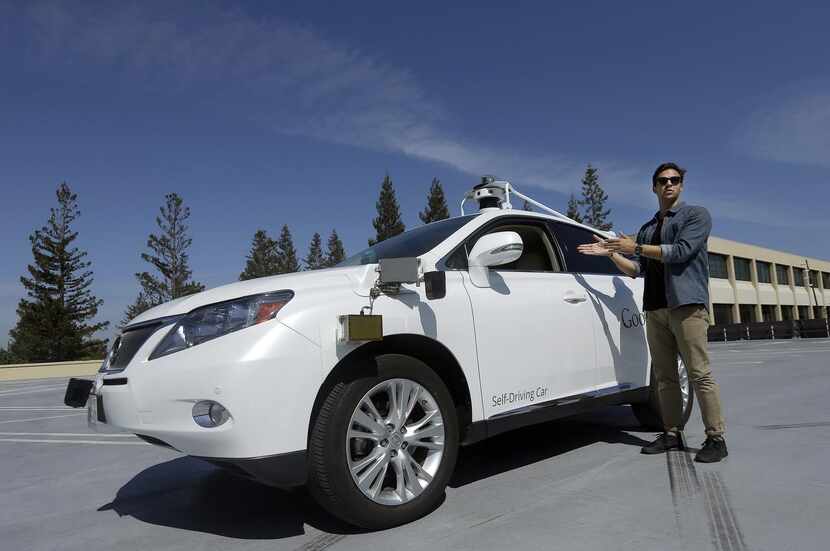 In this Monday, Aug. 24, 2015, file photo, Brian Torcellini, Google team leader of driving...