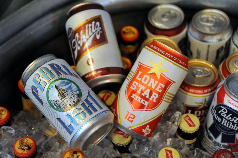 Classic canned beers including Pearl Light, Schlitz, and Lone Star are available at Mother...