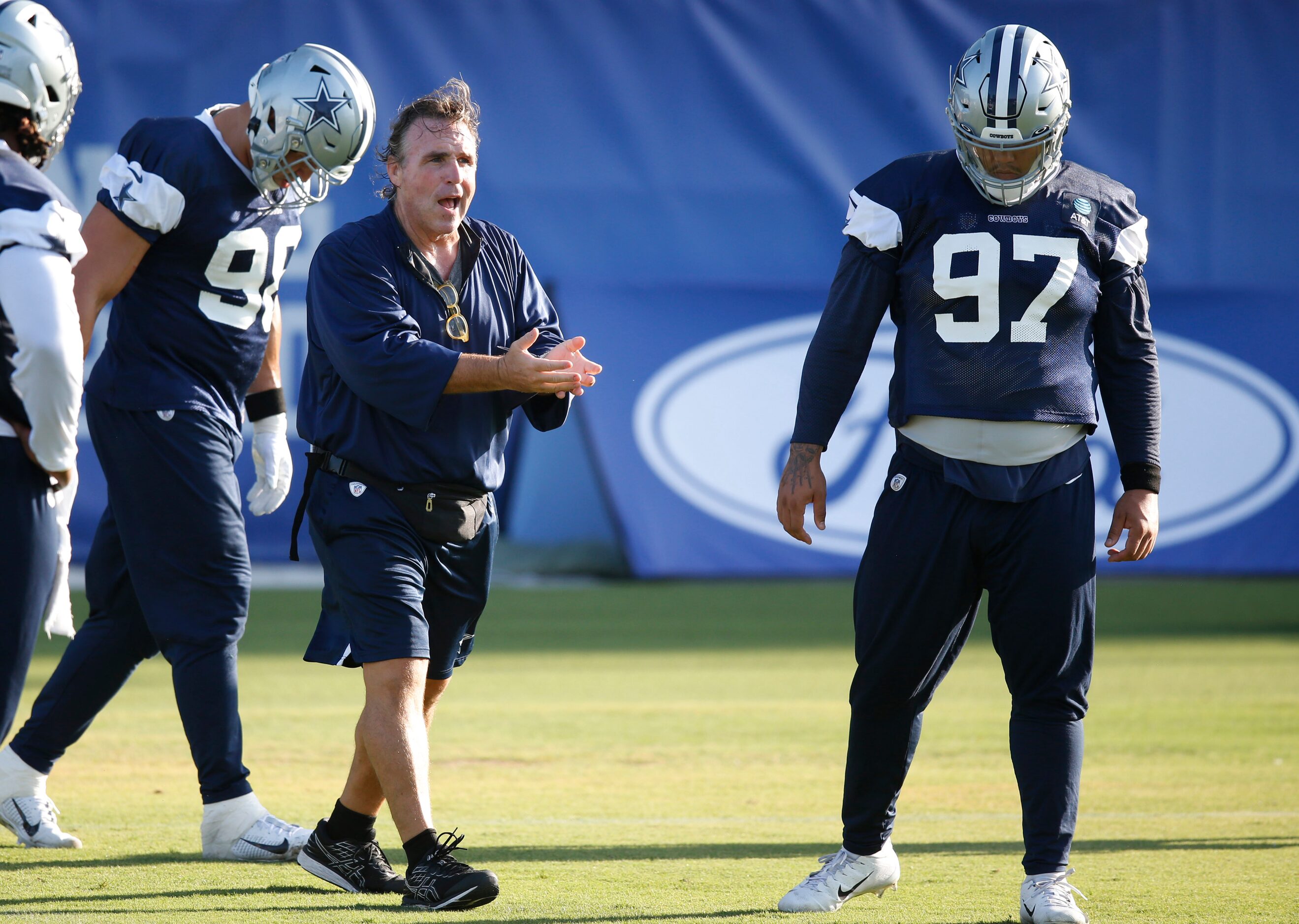 Dallas Cowboys defensive line coach Jim Tomsula works with the defensive line during the...