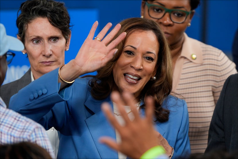 Democratic presidential nominee Vice President Kamala Harris greets supporters at a campaign...