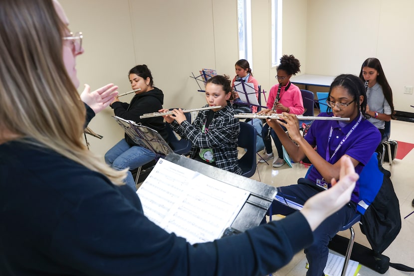 Laura Kidder, teaching artist of the woodwinds leads a sectional practice session as Grecia...