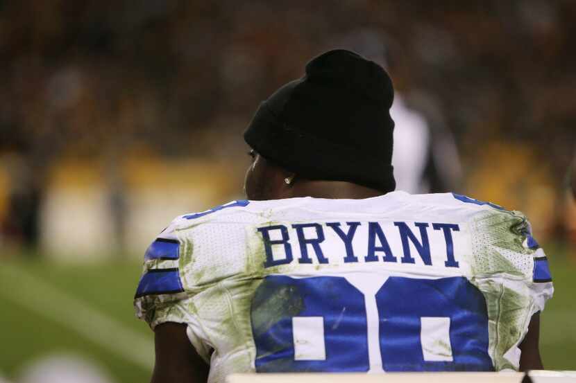 Dallas Cowboys wide receiver Dez Bryant (88) sits on the sideline in the third quarter at...