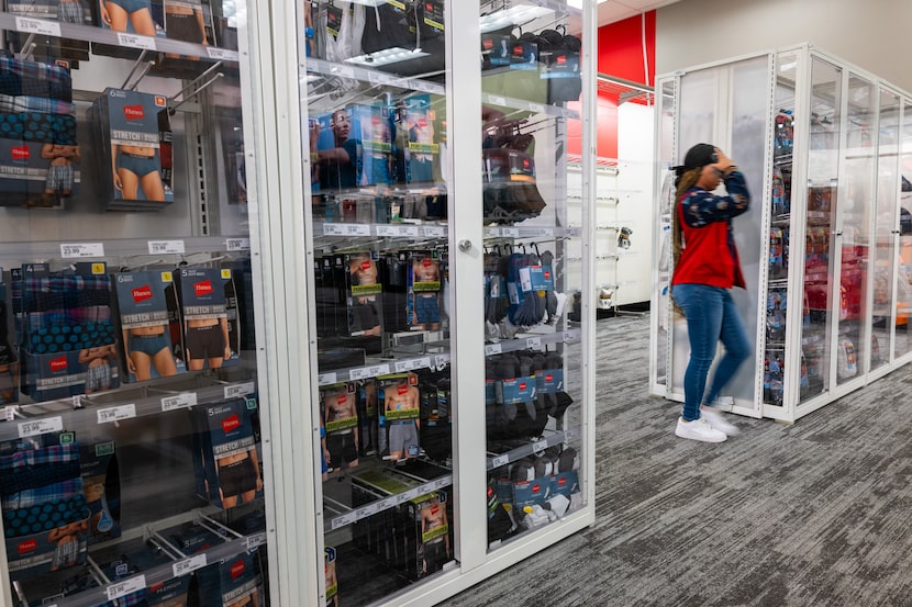 NEW YORK CITY - SEPTEMBER 28: Products sit behind plexiglass at a Target store in the Harlem...