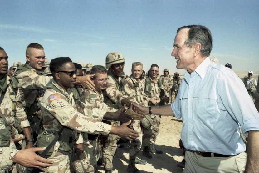 President George H.W. Bush greeted troops at the conclusion of the Persian Gulf War in 1991....
