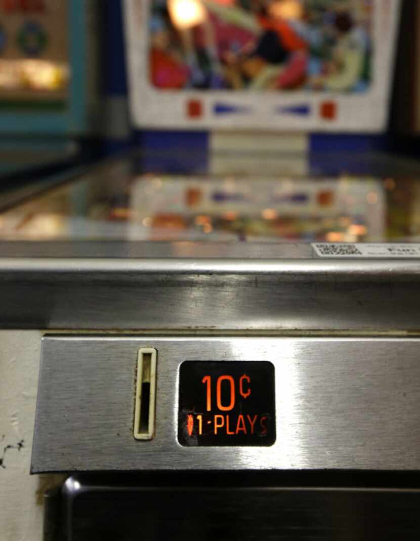 In this Dec. 16, 2013 photo, the 10-cent coin slot for an 1968 Fun Land pinball machine at...