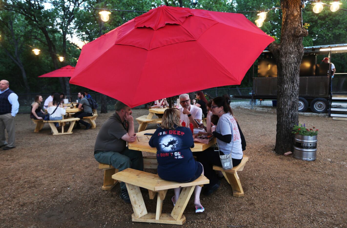 Customers enjoy the cool temperatures, while eatting at Bumbershoot Barbecue,  April 04,...