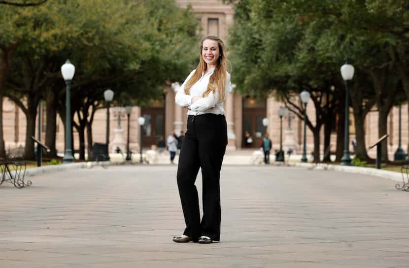 Brittany Gamlen stands outside the Texas State Capitol, where she's interning as a...