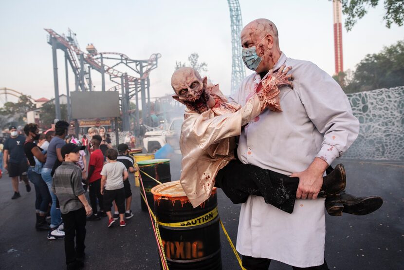 The Lab Doctor and Victor scare families at the Toxic Danger display at Six Flags Hallowfest...