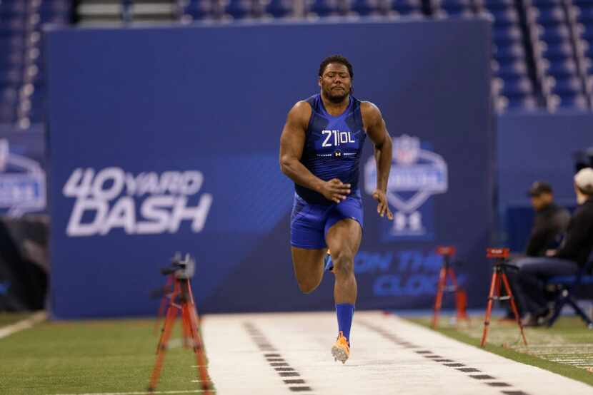 Virginia Tech offensive lineman Laurence Gibson runs the 40-yard dash at the NFL football...