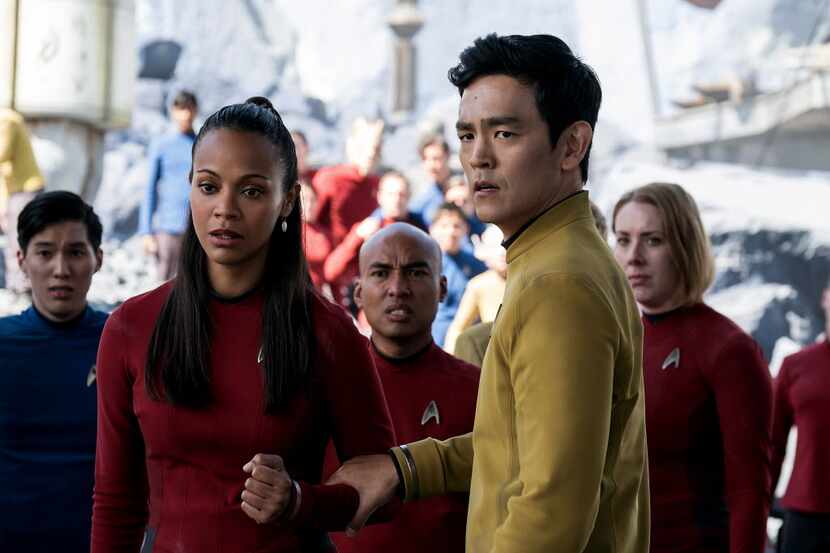 Zoe Saldana (L) and John Cho in "Star Trek Beyond." 
