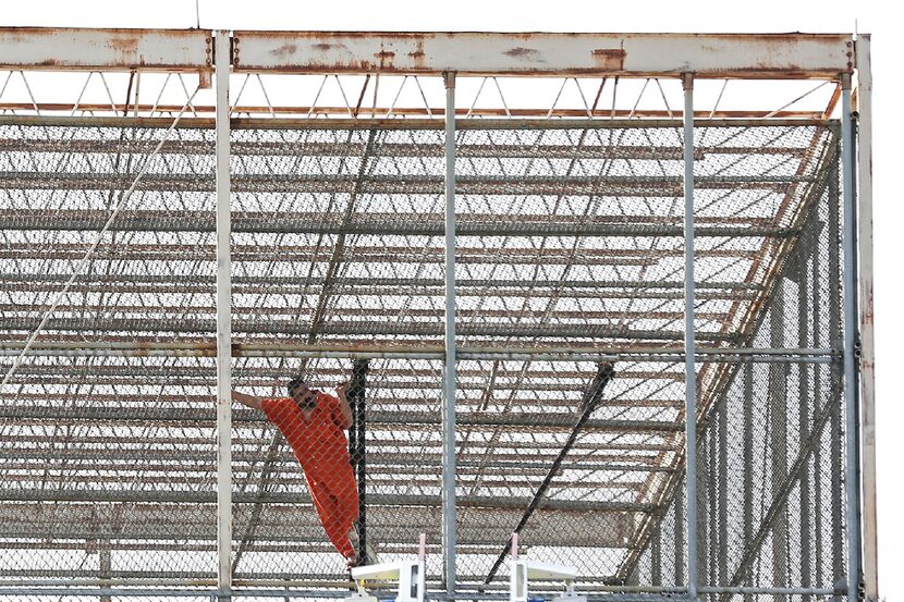 A file photo of a Smith County inmate on the roof of the Smith County Jail in Tyler, Texas,...