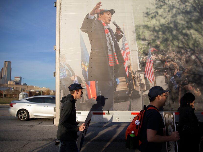 Austin ÒYang GangÓ members walk by the ÒTrukerÕs for YangÓ semi before presidential...