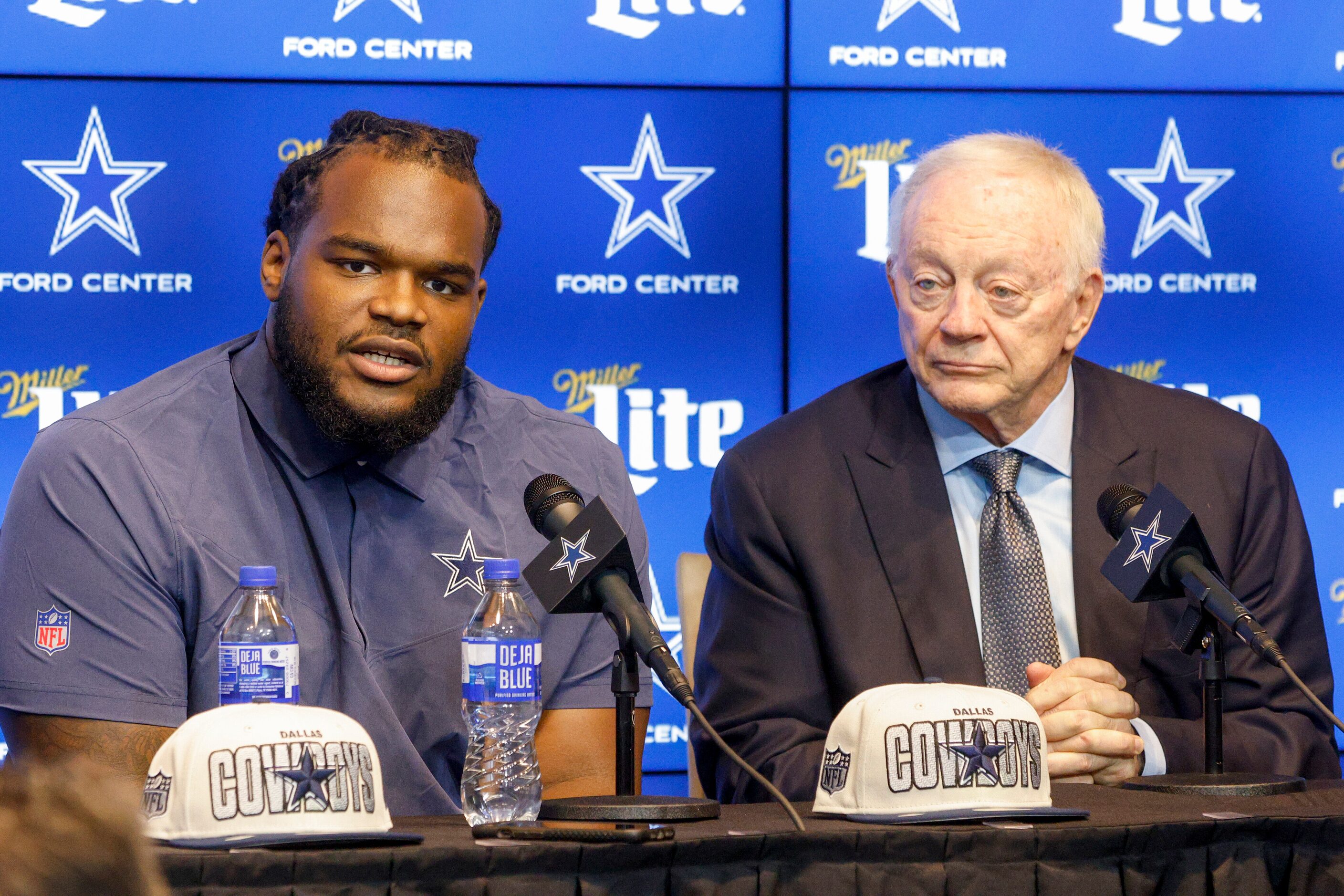 Dallas Cowboys rookie defensive tackle Mazi Smith speaks alongside owner Jerry Jones during...