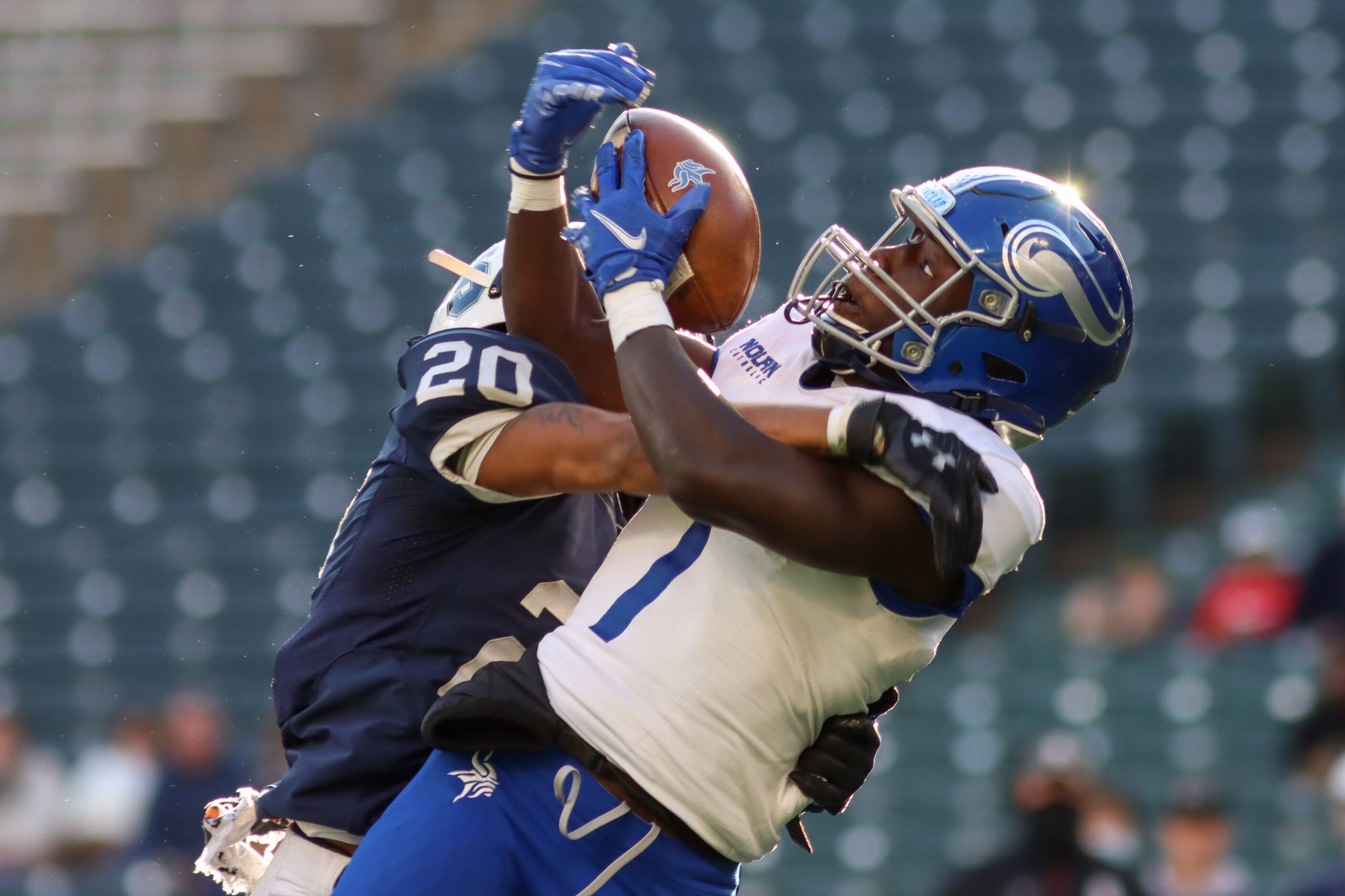 Fort Worth Nolan wide receiver Irene Ngabonziza (7) catches a pass over Fort Worth All...