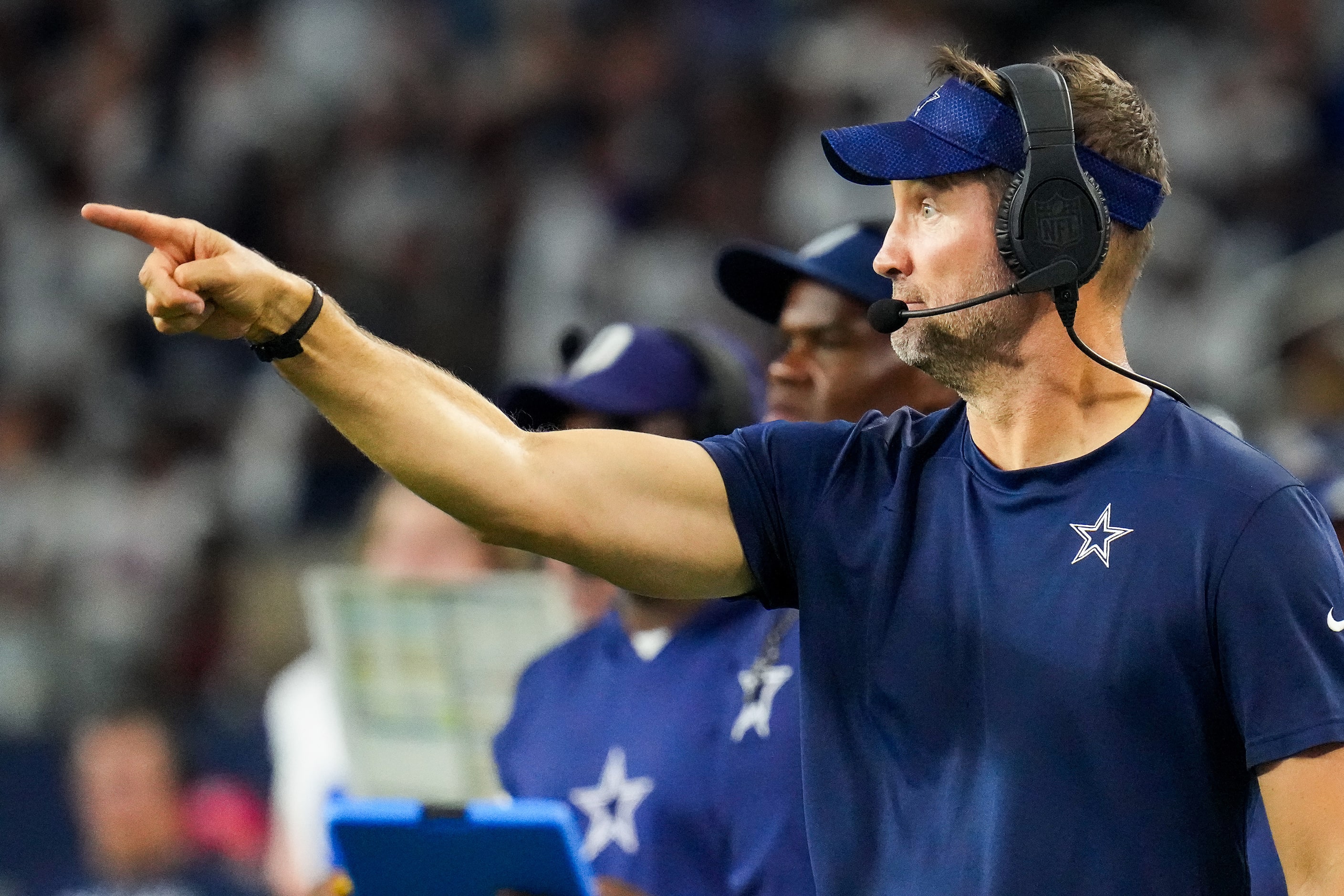 Dallas Cowboys offensive coordinator Brian Shottenheimer works on the sidelines during the...