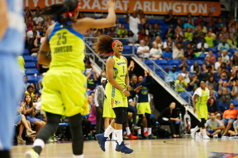 Dallas Wings forward Kayla Thornton (6) celebrates after making a basket late in the second...