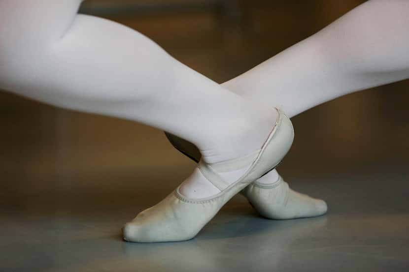 A dancer in a ballet class during the first day of school.