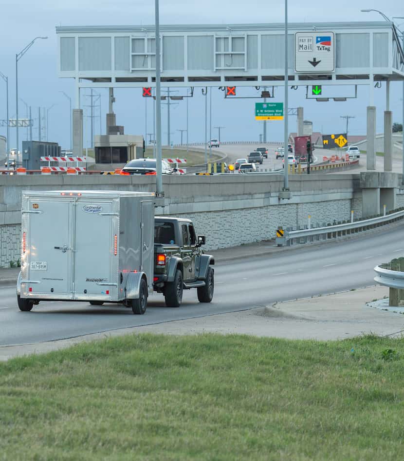 Andrew Hoeft passes by a toll road he has to take regularly to serve his Round Rock clients....