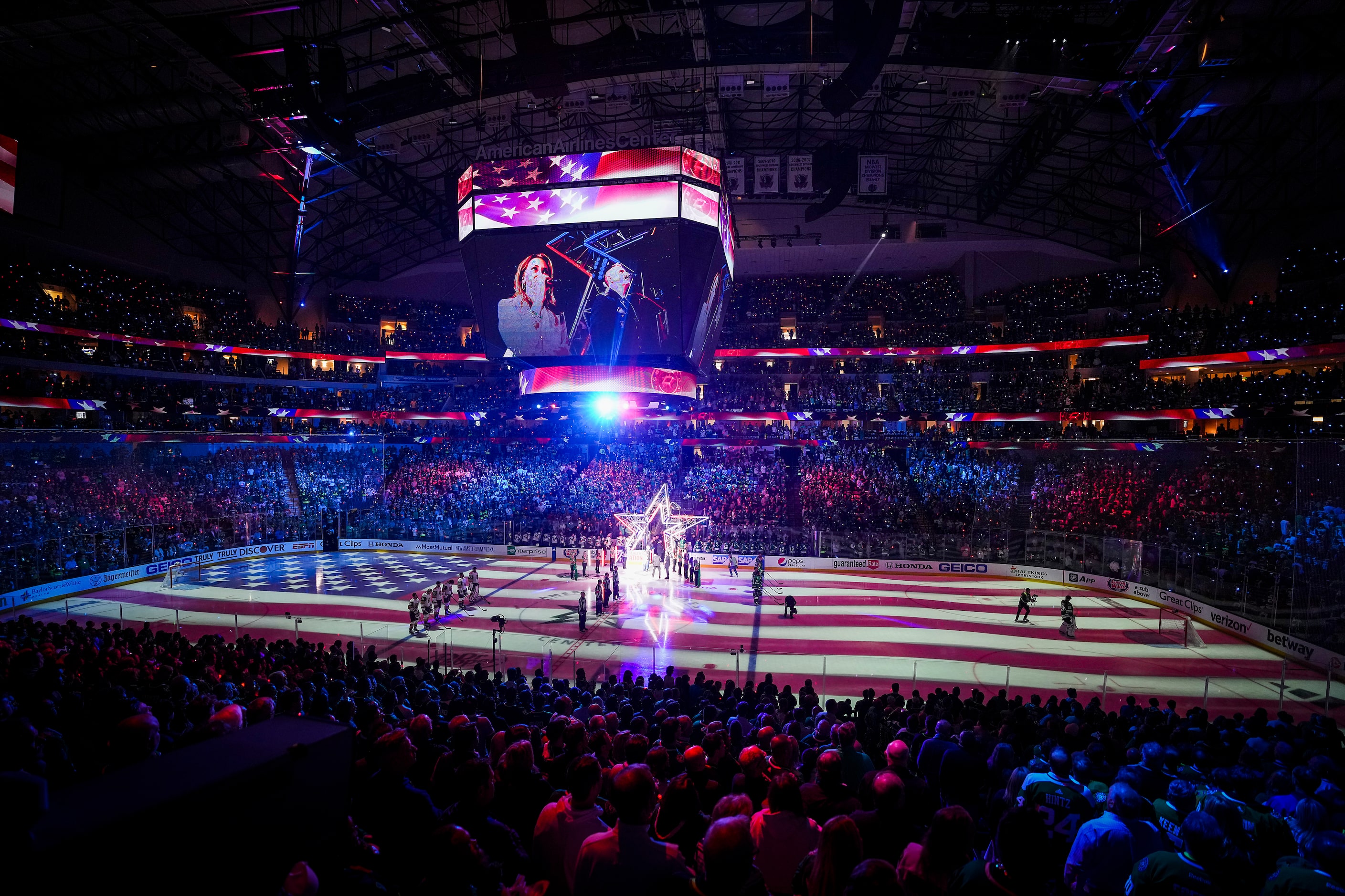 Players stand for the national anthem before Game 3 of the Stanley Cup Western Conference...