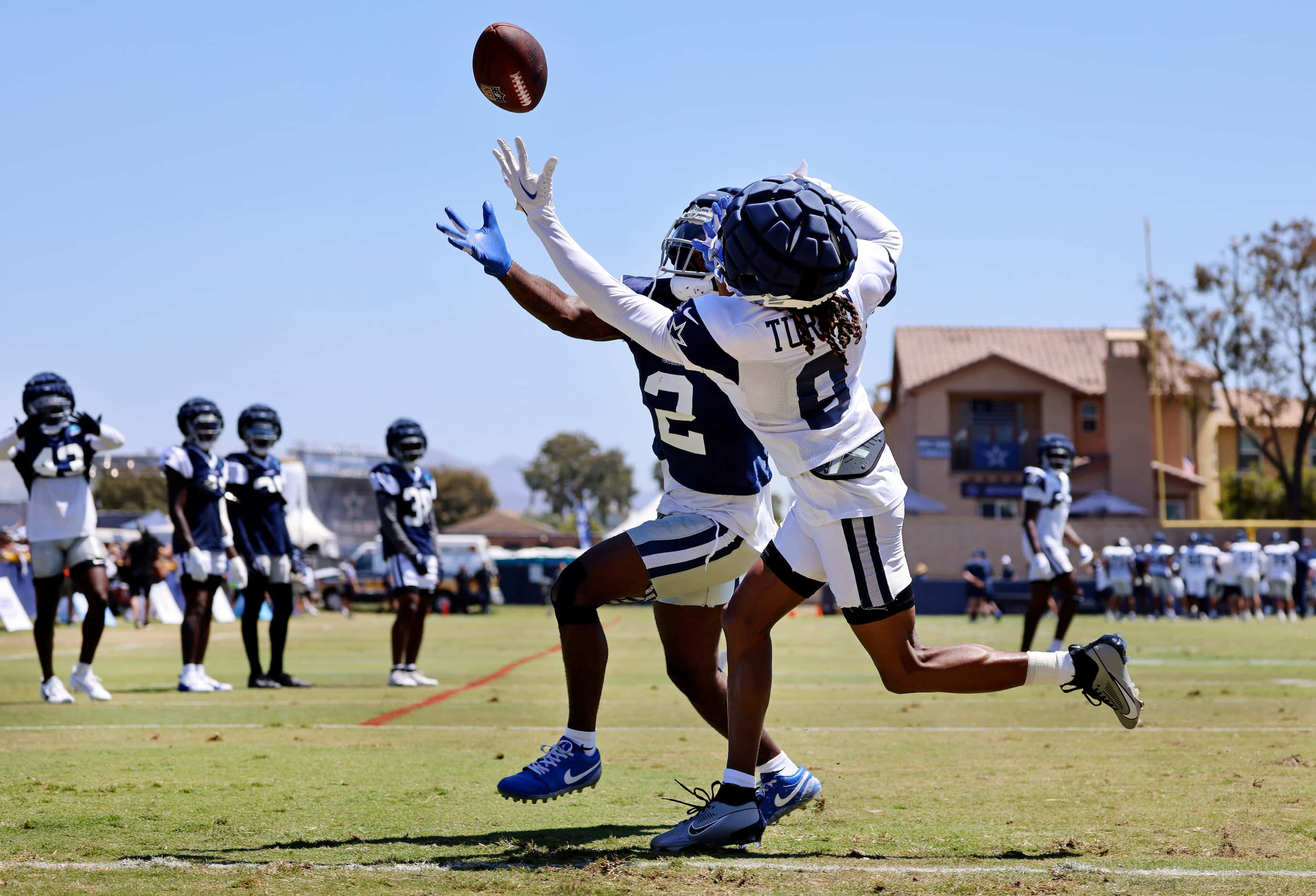 Dallas Cowboys wide receiver KaVontae Turpin (9) tries to get a handle on a deflected pass...