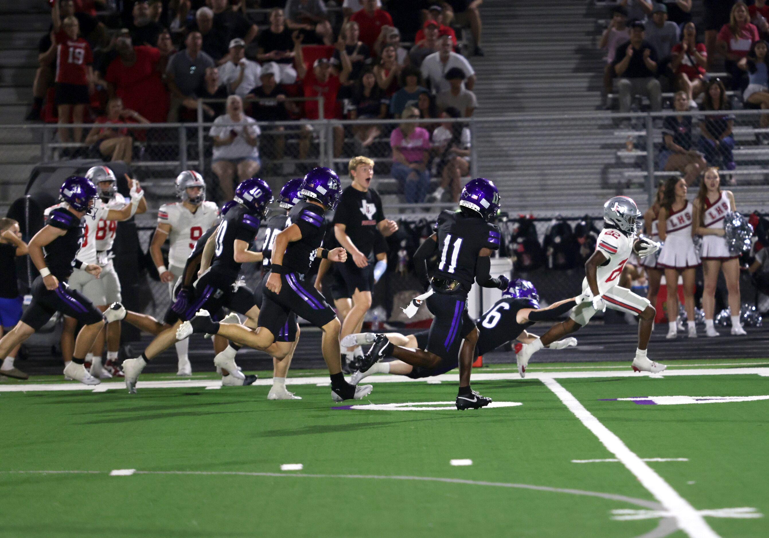 Lovejoy player #22 Zach Jones breaks free from Anna player #26 Damarion Gaston for a...