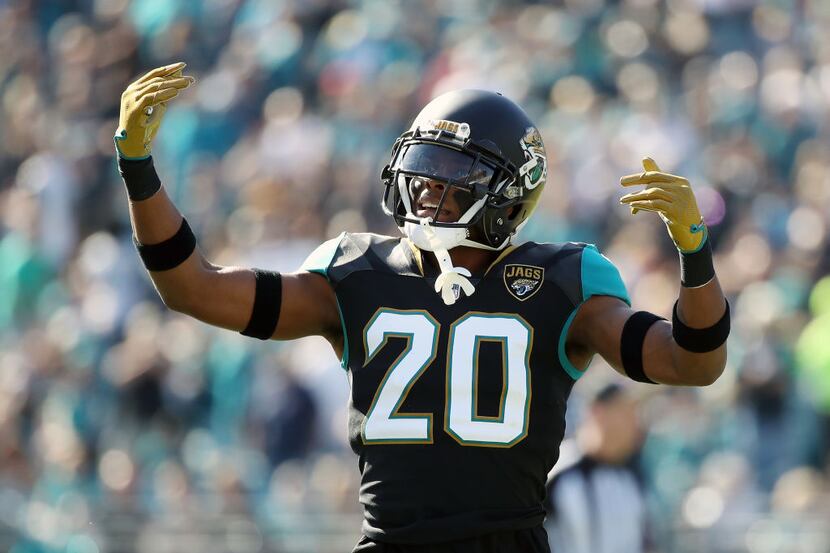 JACKSONVILLE, FL - DECEMBER 17: Jalen Ramsey #20 of the Jacksonville Jaguars celebrates a...