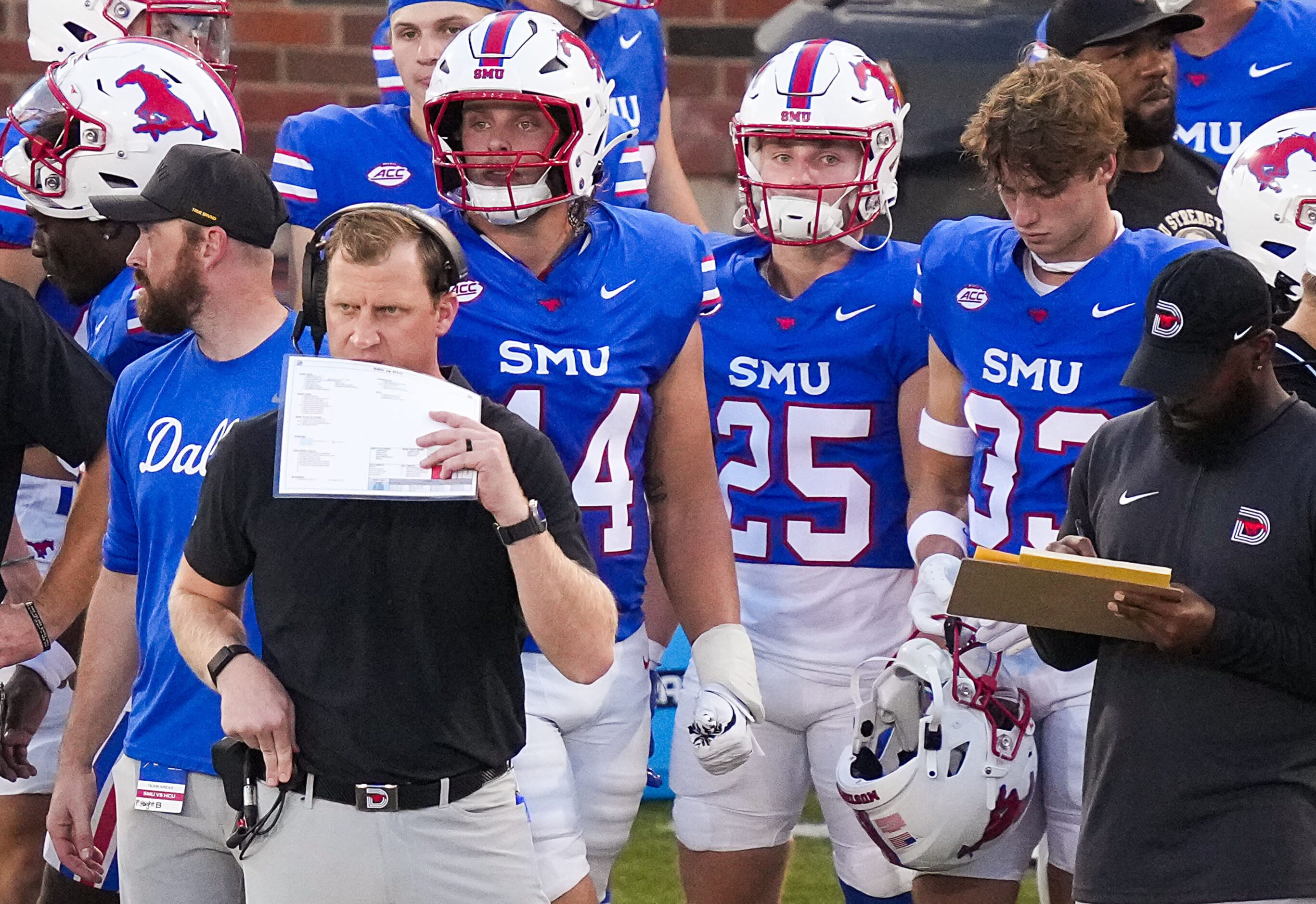 SMU head coach Rhett Lashlee works on the sidelines during the first half of an NCAA...