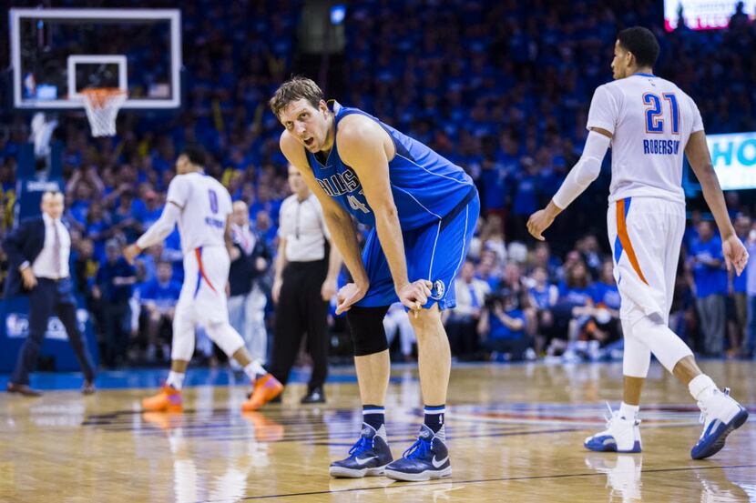 Dallas Mavericks forward Dirk Nowitzki (41) takes a rest during a timeout in the fourth...