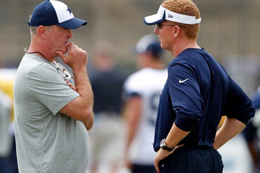 Dallas Cowboys vice president Stephen Jones talks with Dallas Cowboys head coach Jason...