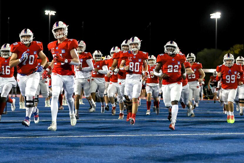 The Parish Episcopal Panthers enter the field to face Fort Worth Nolan in a TAPPS 1-I high...