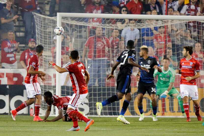 FC Dallas forward Cristian Colman (9) misses a shot on goal late in an MLS soccer game...