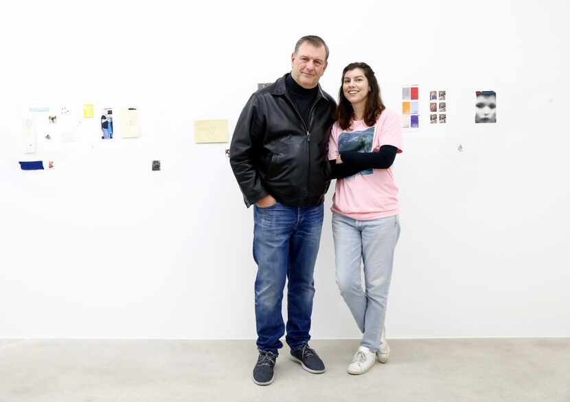 Artist Michelle Rawlings poses with her father, Dallas Mayor Mike Rawlings in front of her...