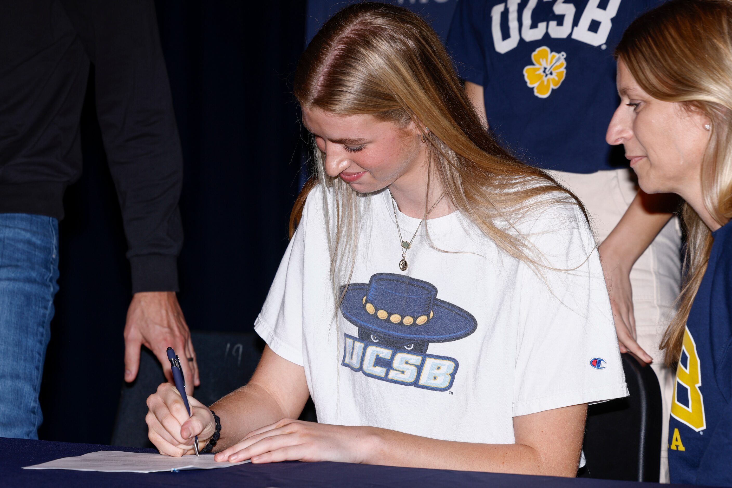 Keller volleyball player Anna Boater signs with UC Santa Barbara during a national letter of...