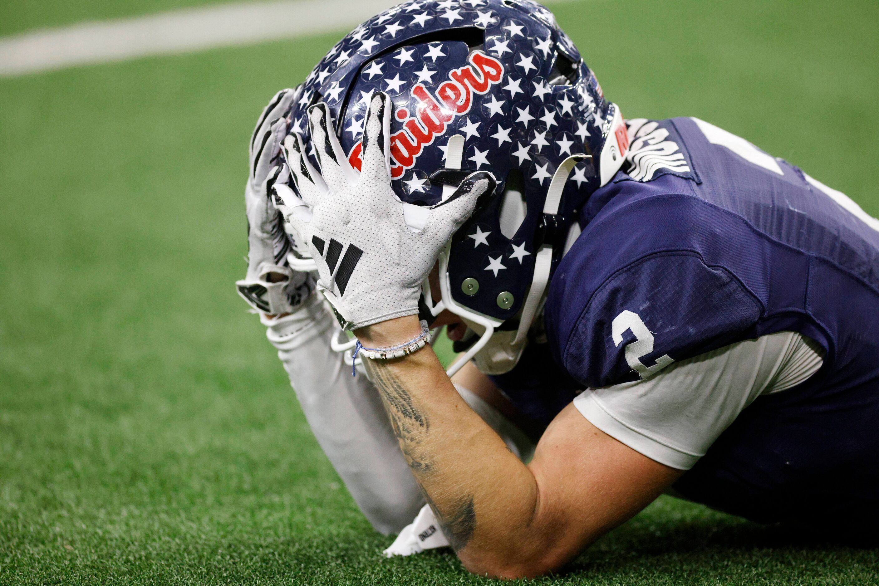 Denton Ryan wide receiver Braeden Mussett (2) reacts after dropping a pass during the second...