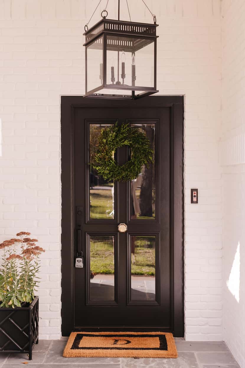 Front door painted glossy black