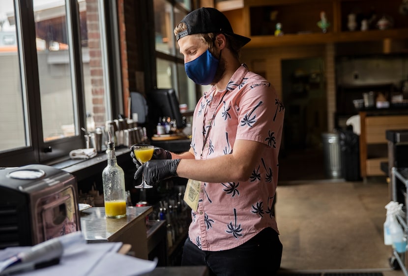 Bar manager Alan Dean experiments with a pickled jalapeno brine at Ida Claire restaurant.