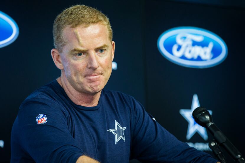 Dallas Cowboys head coach Jason Garrett speaks to reporters at a press conference before a...