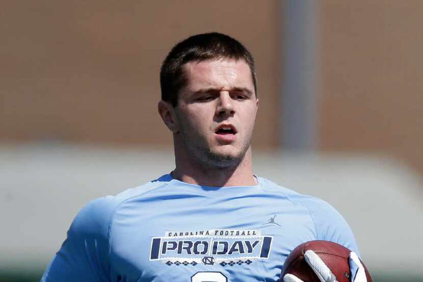 Wide receiver Ryan Switzer runs the ball during North Carolina's pro timing football day in...