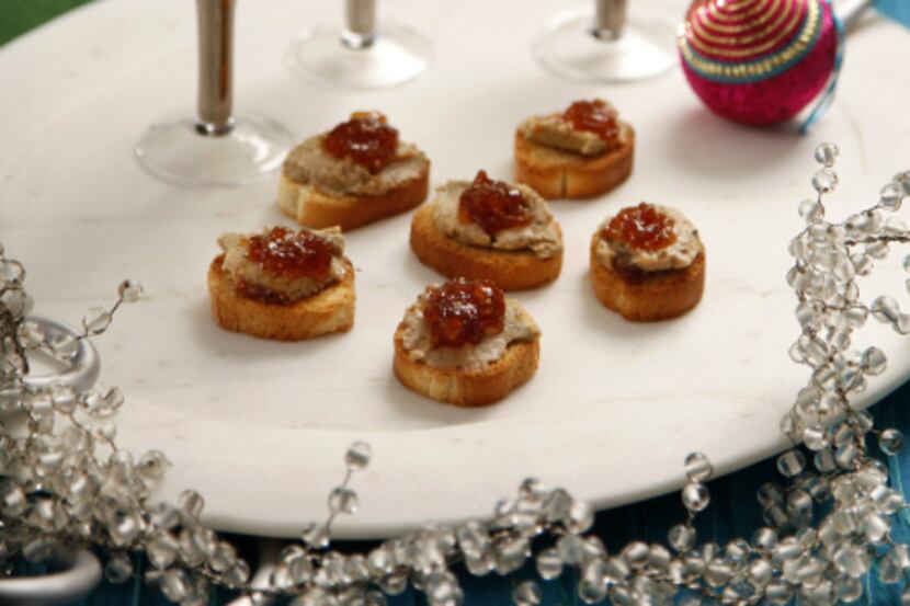 Start off the feat with chicken liver mousse pate and fig jam toasts, accompanied by a pear...