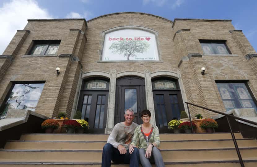 Pastor Mike Connaway, with his wife, Lisa, fell in love with the building he restored for...