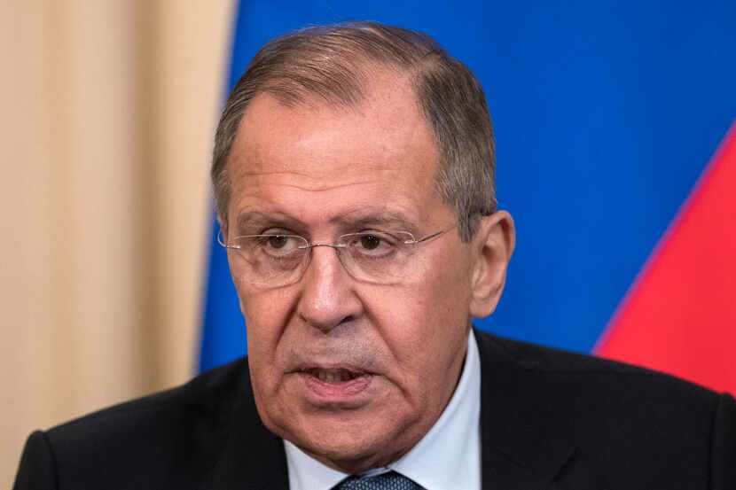 Russian Foreign Minister Sergey Lavrov speaks to the media at a joint news conference with...
