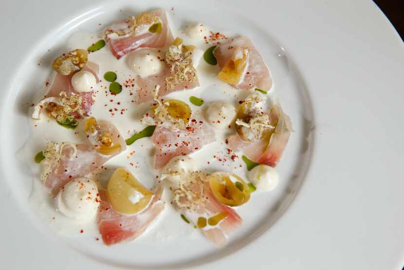 FT33's amberjack crudo with brined green tomatoes, cauliflower puree, parsley oil and fresh...