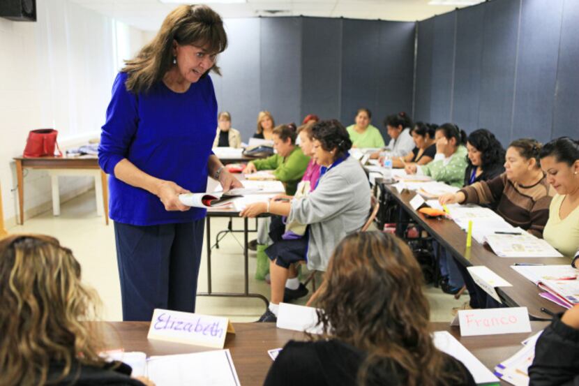 Dr. Catalina García, known simply as Dr. Catalina in this church classroom, teaches an...