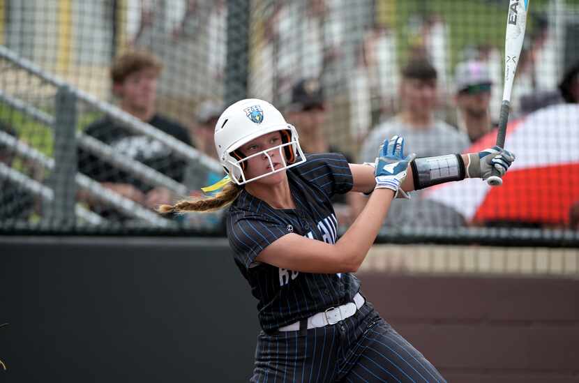 Prosper Rock Hill's Ella Berlage (8) follows through on her swing during game 3 of a Class...