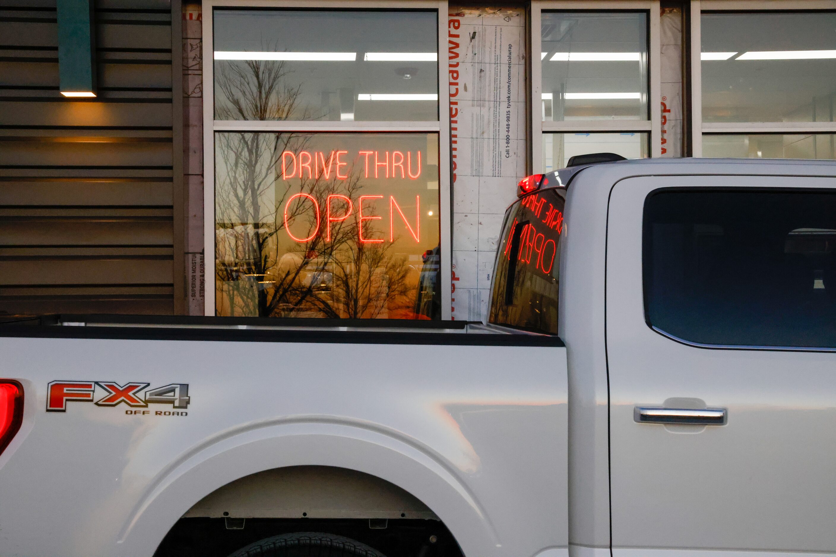 Cars wait for their food in the drive-thru of Portillo’s in The Colony on Monday, Jan. 9, 2023.